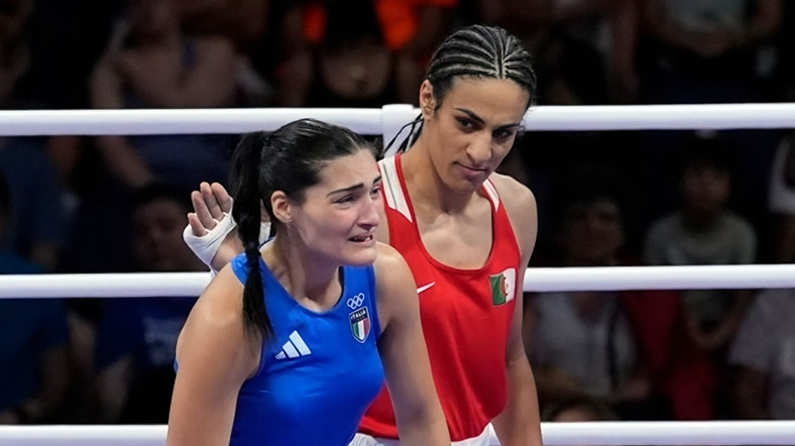Algerian boxer Imane Khelif and Italian boxer Angela Carini in the ring at the Paris 2024 Olympics, with Carini visibly upset.